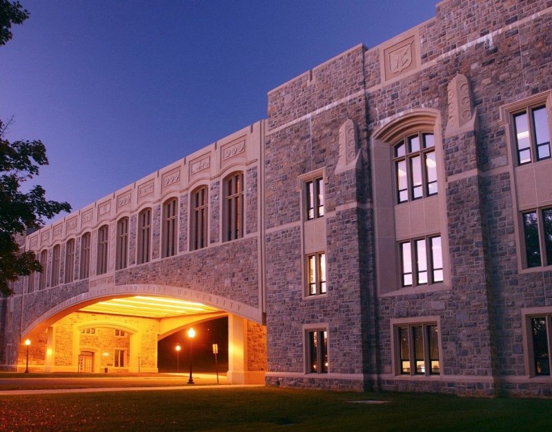 The bridge linking Torgersen Hall with Newman Library at twilight